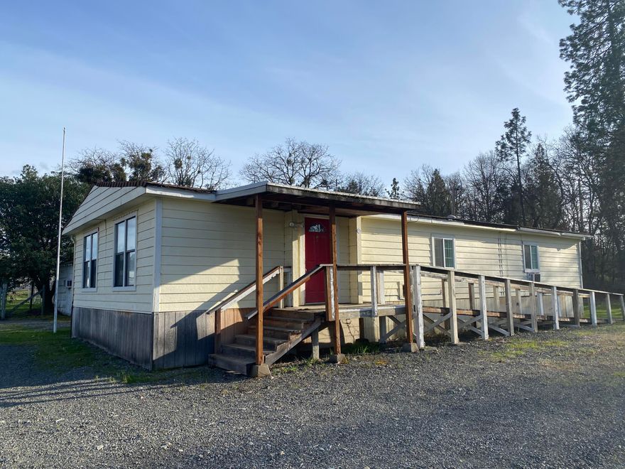 One of the Least Expensive Manufactured Homes out there on the Market at this time! Offering 3 Bedroom, 2 Bath, and 1,344 Sq Feet, this Manufactured Home offers a Large Living Room, Spacious Kitchen, and a Huge Master Bedroom. The Home has Hardy Lap Siding, Decking, and an Approach Ramp on One Side.  This Home has been used more as an Office/Meeting Space for the past many years, so there have been some Interior Modifications done to accommodate for that. Some various aspects of Deferred Maintenance will need to be addressed also, but this is an Amazing Value for the Price! This is the PERFECT Affordable Home to move onto your Vacant Parcel, and quickly create a New Living Space.  Any and All Offers considered, so don't be shy! Absolutely sold 'As-is'. Must be moved from its Current Location at the Buyer's Expense.