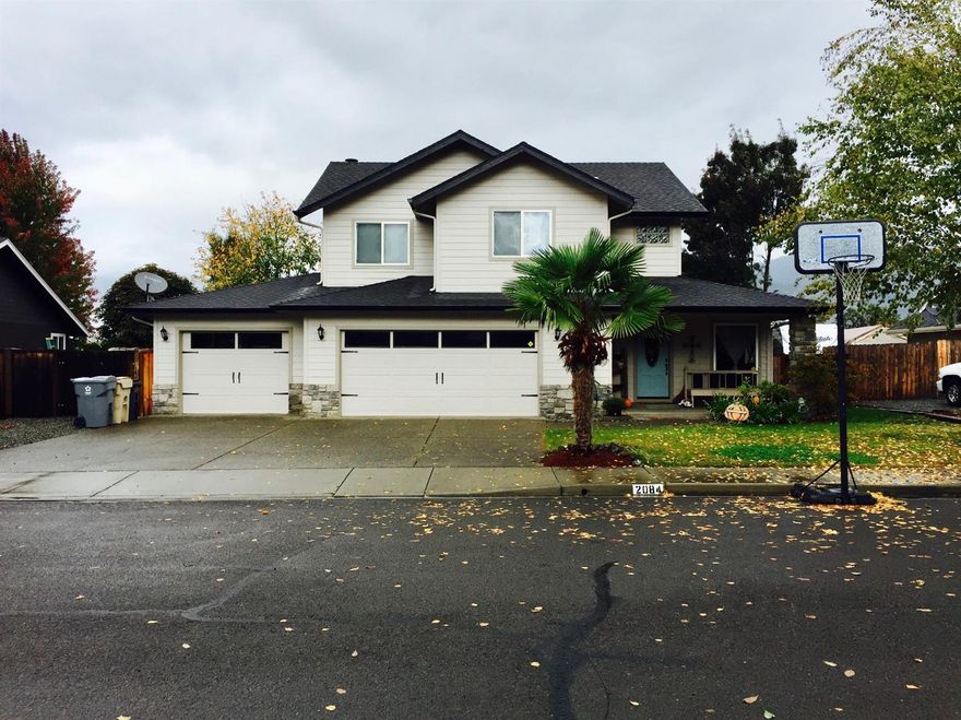 Wow, come see this beautiful 3 bedroom, 2.5 bath home with a three car garage, RV parking, shop, huge cook's kitchen, two living rooms, stunning entree way, custom built-in desk and bunkbeds, cozy reading nook, spacious bedrooms, Master Suite and Master Bath, two Vanities, his and hers walk-in closets, Guest bath with soaking tub, and mature maintained landscaping. From the moment you drive down the street and step inside you won't be disappointed.