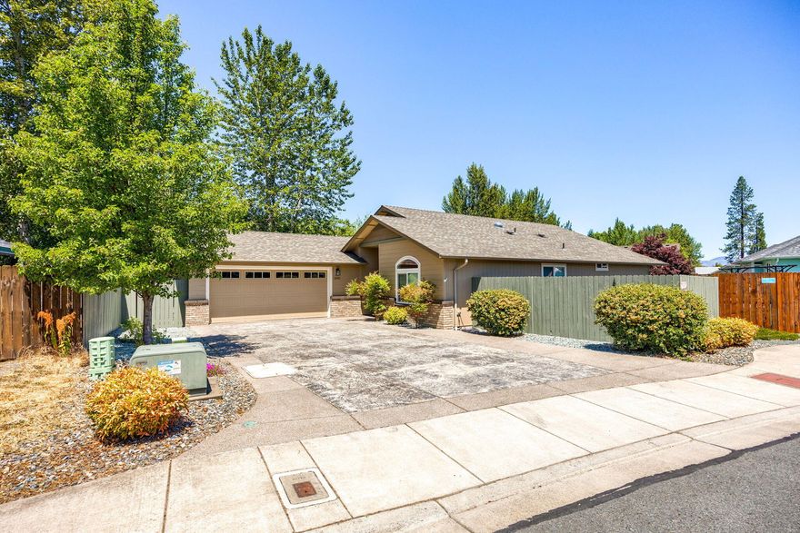 This gorgeous split floor plan is move-in ready! A Kirk Chapman built home with tons of extras and an office! The kitchen has beautiful cabinetry, chiseled edge leather finish granite countertops, eating bar, pantry and all the appliances are included! Engineered hardwood floors in the common areas and carpet in the bedrooms. Large area for dining table. Custom granite countertops in bathrooms and laundry room.  Solar tube in guest bathroom. The skylights have electric shades. The garage is extra wide by several feet with a sink. Newer washer/dryer are included. There are lovely manicured plantings and walkways throughout the propert. Driveway has space for 4 cars on the pretty stamped concrete. Rv parking with power behind the gate.  The gate could be augmented and plantings moved to create a space about 20 ft long by about 15 ft wide for R.V parking. There's lots of space for storage in the side yard behind the garage as well. It's rare to find a home this sharp and well cared for.