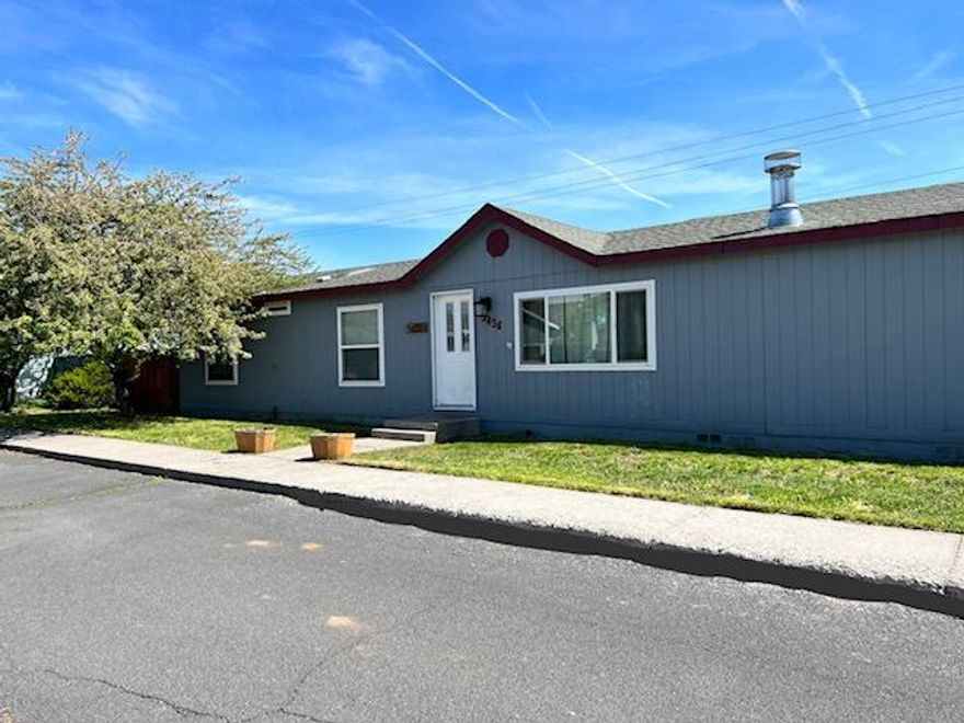 Hard to find 4 bedroom, 2 bath manufactured home with 1782 sq. ft. located in the Suburbs on a large double lot.  This home features a living room, family room, kitchen, dining, laundry room, split floor plan, large covered deck, attached garage, large 24x32 detached carport/workshop/storage, fenced backyard and room for RV parking.  A must see!