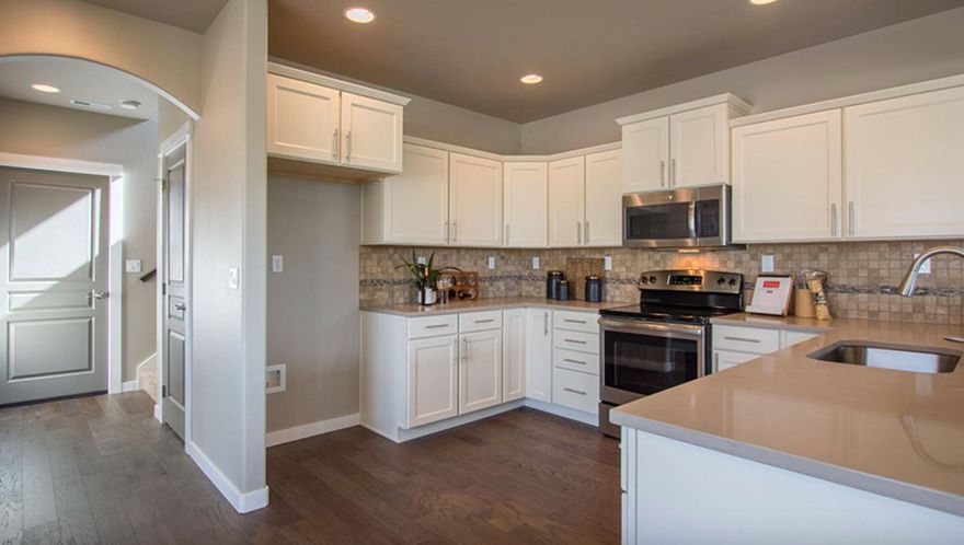 The 1787 square foot Metolius is an intelligently designed two-story plan that lives larger than most mid-sized plans. The first floor is open throughout the family and dining room and into the kitchen where there is plenty of counter space and cupboard storage. The alley-accessed garage gives this home tremendous street appeal. Upstairs, the versatile loft area can be converted to a fourth bedroom or den. The expansive master suite features a dual vanity bathroom and large closet. Rounding out this popular floor plan are two spacious bedrooms with large closets that share a second full bath.