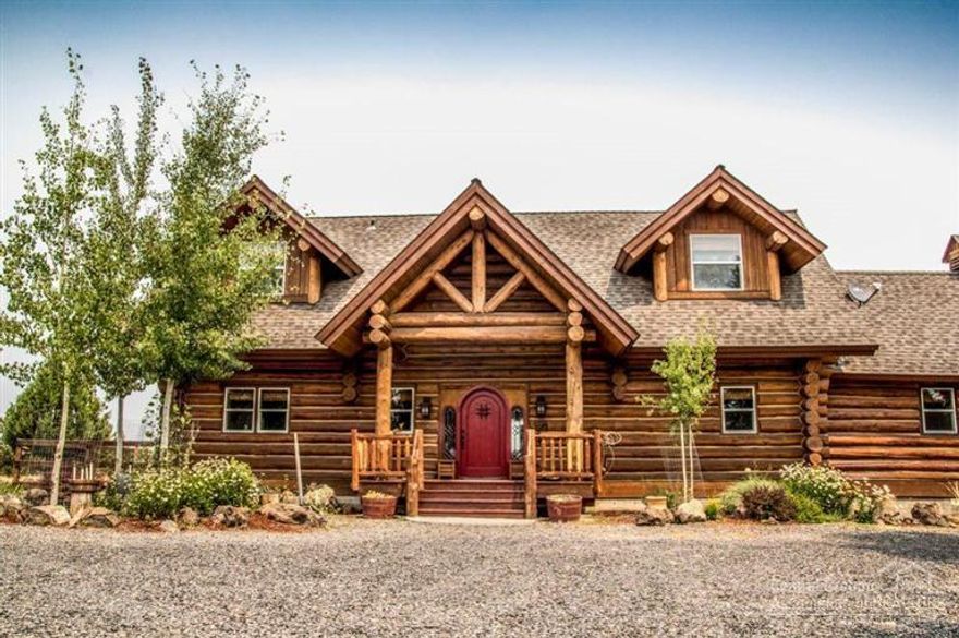 Fall in love with this gorgeous Log Home in Crooked River Ranch situated on the Rim. This home has amazing views of the mountains and the river. A private deck overlooking the rim is perfect for entertaining. The master bedroom is on the main level with its own sitting room. The wood stove in the living area makes the home warm and inviting. There is a separate garage/shop with a room above that can be finished for guests. The property is perfect for horses.