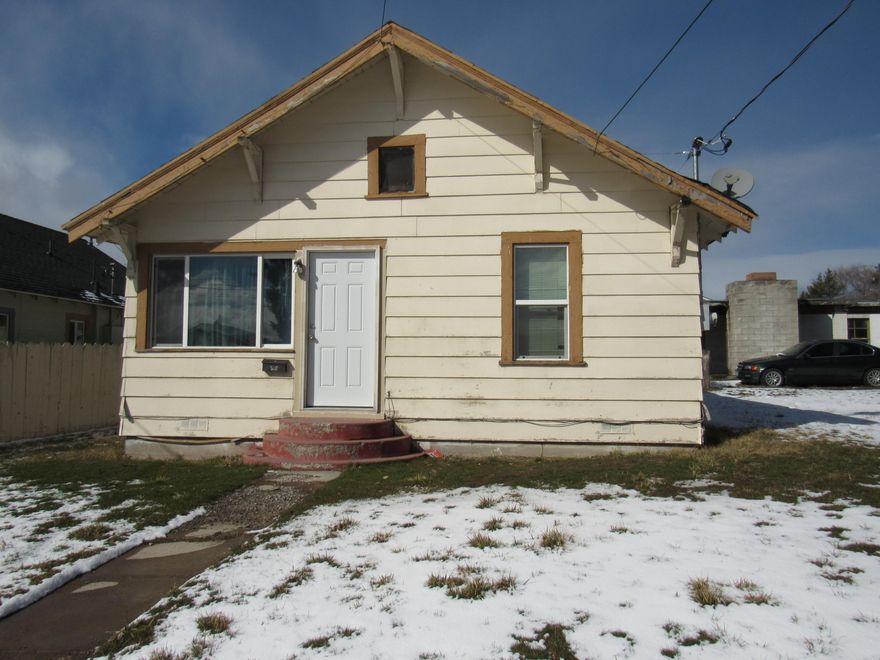 This 3 bedroom, 1 bath home has a lot of potential. It is located on a corner lot. Detached garage and it has a detached carport.