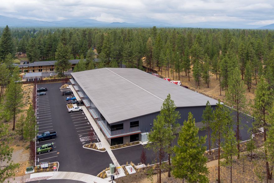 Sitting on 2.51 acres and a very short distance from Hwy. 20 and Hwy. 126, the Ponderosa Building is located in the Sisters, Oregon business park area. With an attractive design and multiple smart use features, this development is both functional and fashionable. With generous tax incentives, a motivated landlord, and being the closest flex space/industrial/warehouse building in Deschutes County to Salem & Portland, this building is one to consider for your operation.

Consider these features: 
> 14' roll up doors, full circular truck access driveline, and lots of parking
> Three-phase power, energy efficient fixtures, and good natural light
> Monument sign, attractive and modern finishes, multiple size options
> Possible tenant improvement allowances and other lease incentives
> All suites include an office and bathroom in the asking lease rate, with the ability to construct additional interior spaces
> Building height is 30 feet at center and 22 feet at the eaves
> 3 Phase