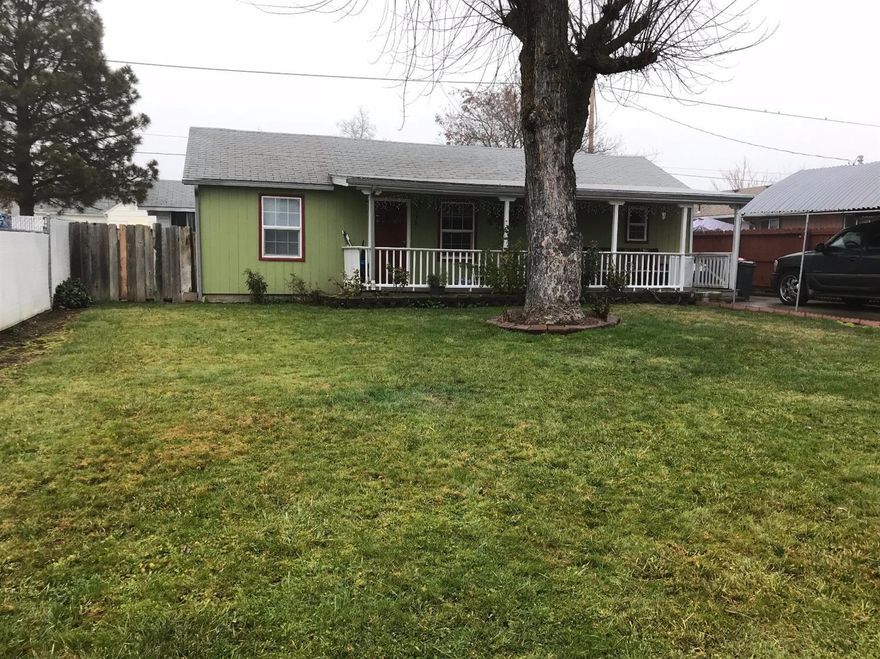 Great 3 bedroom home with tile floors. Nice wood cabinetry in kitchen, separate dining area, ample off street parking, with large front and back yards. New tape, texture and paint inside. Call to tour