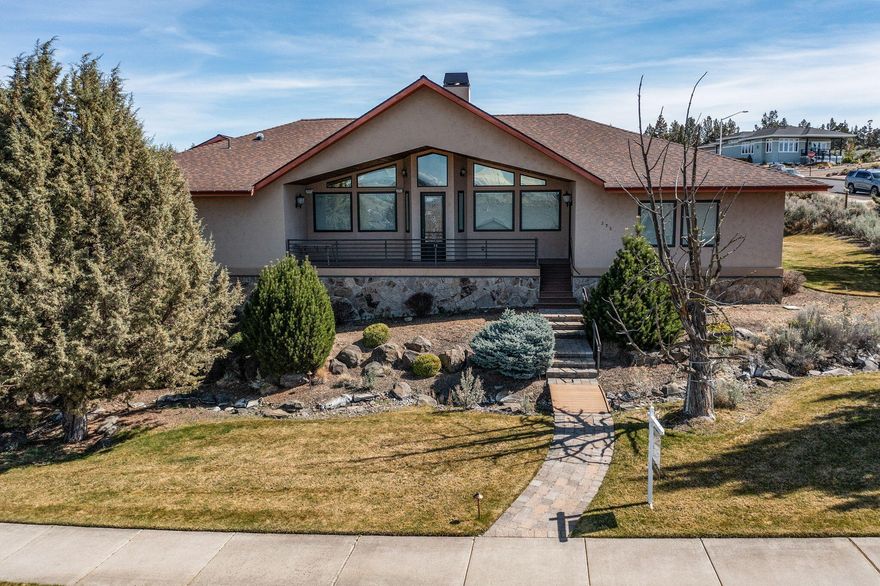 First time on the market! This stunning single-level custom home in desirable Yarrow sits on an oversized .56 of an acre corner lot. No expense spared—3BD, 4BA, 2,720 SF Earth Advantage home w/ stucco & masonry exterior, paver stone pathways & driveway, Trex deck & custom wrought iron railing. High-end landscaping w/ water feature. Covered back porch with natural gas built in firepit. Interior offers vaulted ceilings, stone  natural gas FP, hardwood floors, surround sound in & out. Great room layout, gourmet kitchen w/large center island, granite countertops, stainless steel appliances & built-ins. Oversized primary suite w/ jetted tub, tiled shower & WIC. Secondary primary suite. All major appliances incl. Mud/laundry room w/ extra storage. Oversized 3-car garage finished with epoxy floor and solid wood garage doors + 4th storage garage. Forced air, heat pump & tankless gas WH. There is too many upgrades to list, a true must see for yourself! Pure quality & luxury!