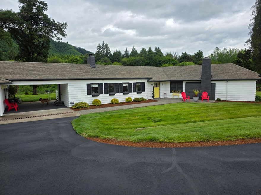 26+/- acre estate with a 2300 sq ft, 3-bedroom, 2-bathroom home offering panoramic views and abundant wildlife including elk, deer, and bear. Features 0.50 miles of Elk Creek frontage with excellent trout and steelhead fishing, a leveled hay field, and robust infrastructure. Includes a gated, half-mile private drive, well, septic system, an approx 60x20 ft two-story equipment barn, a approx 40x60 ft two-story horse barn with eight stalls and a tack room, a recreational space, and a guest room with private bath. Landscape boasts mature cedar trees. Conveniently located near Highway 38, 40 minutes from coastal towns, and in the North Douglas High School District.