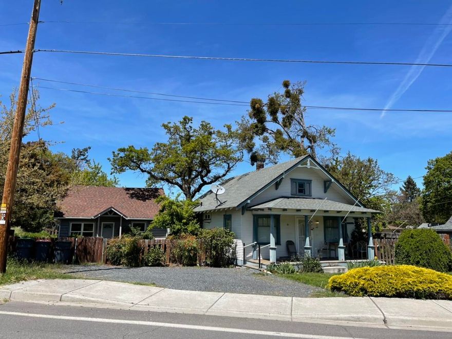 Attention investors!  The is the perfect opportunity to own two houses on one large lot!  Live in one and rent the other or rent both units.  Lots of updates in both houses with new paint, flooring, kitchen cabinets and more!  The original home was built in 1920 with 846 sq. ft. and has lots of character with an open floor plan and high ceilings.   Updated kitchen with brand new appliances. It also has an updated Jack & Jill bathroom between both of the bedrooms.  The 2nd home was build in 1950 with 816 sq. ft. with one bedroom downstairs and one bedroom upstairs.  New kitchen cabinets and appliances.  Both yards are fully fenced for privacy.  Ample parking in front of the houses or in the alley behind the houses.  This is a great opportunity to own an income property in Phoenix!