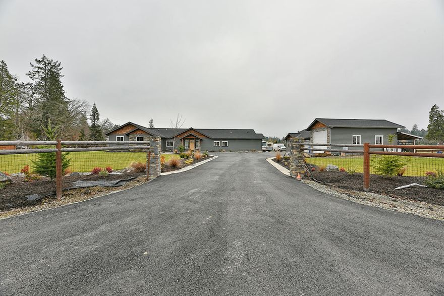 Exceptional custom private estate on a large 2.5 Acre lot close to town yet private. Custom 4BD/3BA split floor plan home, over 3000ft² sparing no expense when it came to size & amenities. 650ft² living room w/ vaulted ceilings, 12 windows for natural light and a perfect view. Natural wood & radiant floor heating throughout. Chef's kitchen, granite countertops, dbl fridges, dbl ovens, lg gas stove, stainless hood, lg island, & walk-in pantry. Lg master BD, vaulted ceilings, huge walk-in closet, jacuzzi tub, dbl sinks, & tile shower. Very energy efficient, 2nd master, lg guest BD. 500ft² covered stamped concrete patio, enjoy mature landscape/ mountain views, & fully fenced. Massive shop including a 400ft²office above w/ RV garage offering a total of 2140ft²shop space. Attached to the shop is a 1BD/1BA apt w/ a full kitchen w/granite countertops, gas stove, & private entry. Plenty of land left to make your own!