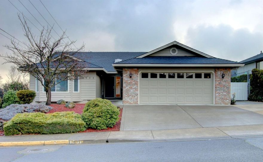 Main Level Living in East Medford! Stunning Open floor plan with vaulted ceilings! Kitchen features newer stainless steel appliances, granite countertops, hardwood floors and built in breakfast bar. Upgrades include organic carpeting, fresh coat of paint, new Amana heat pump, and roof has been replaced. Very Large living room includes two sliding doors to the back yard and allow an abundance of natural light to enter the home. Front and backyard are beautifully zero-scaped. Back yard features patio stone pavers, turf grass, water feature, and mature hedges for privacy. Gated RV parking is perfect for a small fishing boat or small camper and is approximately 8 ft wide by 40 ft long. Large City Park is conveniently across the street!