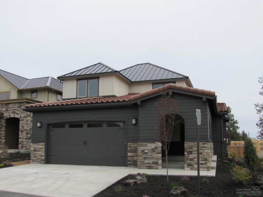 Woodhill Homes' new NW Bend neighborhood, single family homes. This gorgeous new home on a corner lot has the master on the main floor along with a large kitchen/dining area and spacious great room with a gas fireplace. 2-bedrooms, bath, loft area & utility at the top of the stairway. Kitchen features solid surface counters w/tile backsplashes. master has dual vanity, tile shower & walk-in closet. Patio off great room for outdoor living space. Neighborhood amenities include option to join clubhouse/pool.