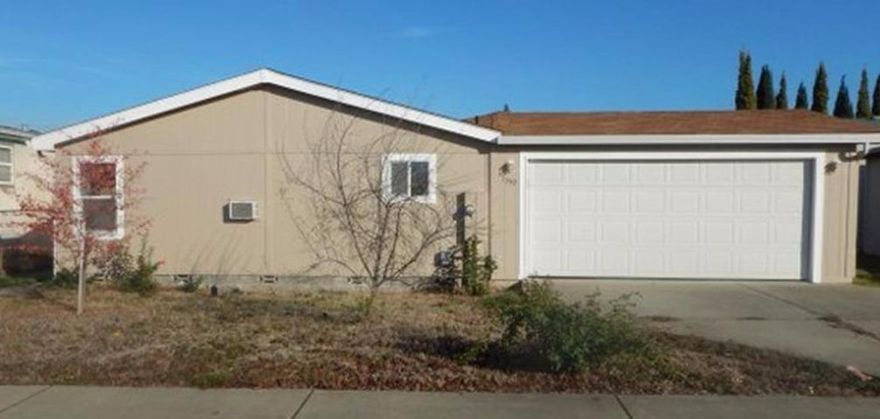 Beautifully remodeled home on it's own land. Close to town and convenient shopping. 3 bedrooms, 2 bathrooms, and attached garage. Open Kitchen to dining area, living room has vaulted ceiling. Updates include new exterior and interior paint, new counter-tops, vinyl flooring, and stainless steel range/oven.