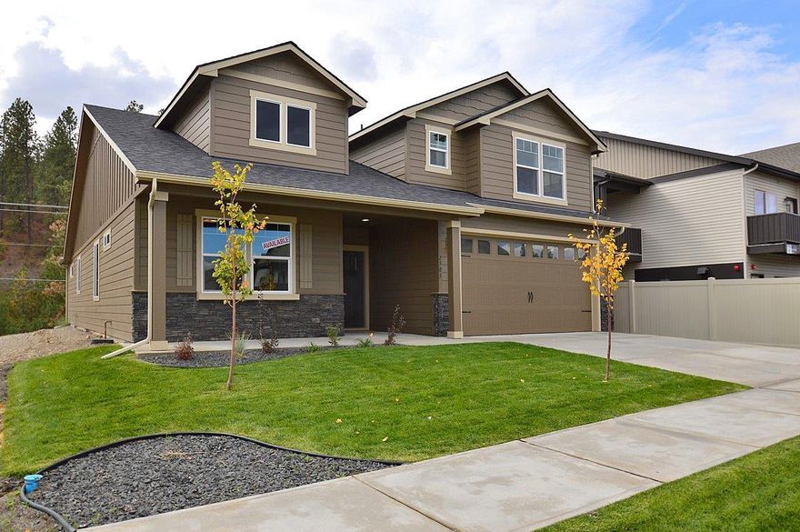 Flexible space is the greatest asset of this Encore floor plan based upon the best-selling Orchard model. At 2,258 square feet, this larger home is a favorite of frequent entertainers for its expansive kitchen, walk-in pantry, and adjoining, open living and dining areas. For an added bonus, choose between an optional desk or beverage center along one wall to complete this beautiful layout. The spacious and private master suite boasts a deluxe ensuite with dual vanity, separate shower and an enormous closet. The other two sizable bedrooms, one of which can be converted into a den or office, share a second bathroom. Exclusively available for the Orchard Encore, choose between an excessive bonus room or optional Jr. Suite as a generous fourth bedroom - this option offering a walk-in close and it's own full, private bathroom - located just above the garage Pictures are similar.