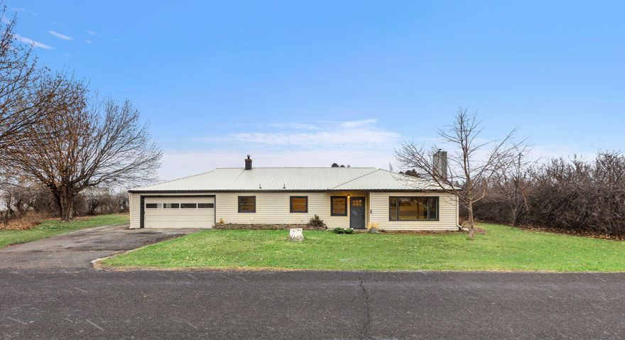 Beautiful updated home with lots of character on one acre within minutes of the charming town of Prineville. Brand new flooring, fixtures, paint, Furnace, water heater and lighting throughout this one level home.  There is a space for an office with it's own separate  entrance or use for a fun recreational space. Outside has a barn, chicken coop, shed and outbuildings perfect for 4-H animals. Come check it out today!