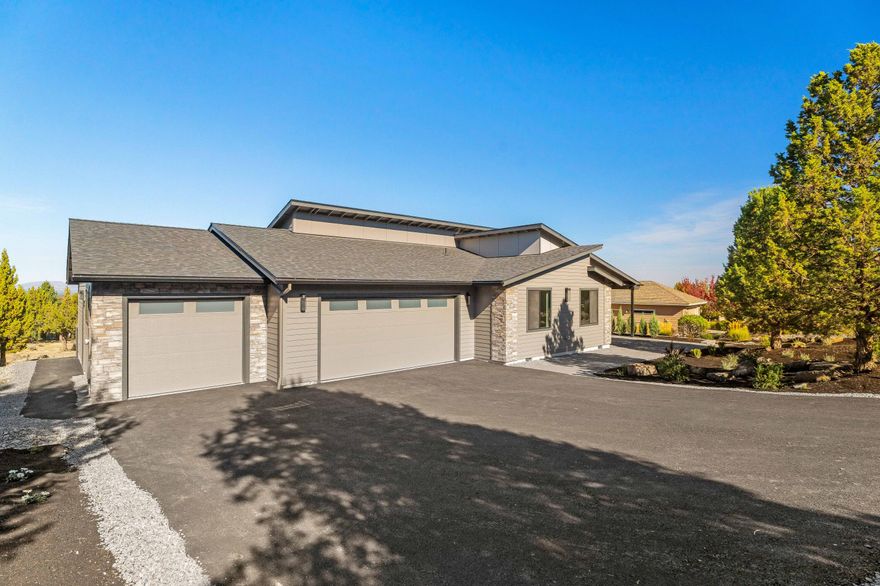 Don't miss this opportunity to own this masterfully crafted BRAND NEW HOME in beautiful Eagle Crest Resort! Located on the West Ridge with gorgeous views of Smith Rock, this home has a 620 Sq Ft raised paver deck and backs to common space for maximum privacy. The single-level open concept floor plan features 3 bedrooms, 2.5 baths, a dedicated office, solid White Oak Rift front door and cabinetry, a vaulted great room with clerestory windows, stacked stone fireplace, engineered White Oak hardwood floors, solid quartz countertops, and contemporary design elements throughout. The kitchen boasts stainless appliances, a gas cooktop, and an expansive island with breakfast bar. Luxurious primary suite with a tiled walk-in shower, free-standing soaking tub, double-sink vanity, and a spacious walk-in closet. The triple-car garage completes this exceptionally crafted home. Eagle Crest is home to three 18 hole golf courses, three sports centers, a day spa and miles of trails.