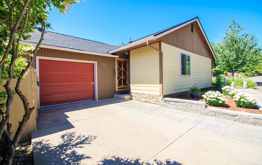 Affordable Ashland living! This small neighborhood on a cul-de-sac offers a quiet suburban feel blocks from the Plaza. The one-level floor-plan makes this the perfect starter home, part-time home or retirement home. Recent updates include in 2018 New Roof & HVAC. In 2019 Kitchen Remodel. 2020 New Vinyl Plank floors, steel counter-tops & tile back-splash, bathroom remodel, new kitchen and bathroom windows, and new siding. The garage has french doors that bring in lots of natural light and access to the private back yard. Mature trees create a shady space over the patio in the private, updated fencing and back yard landscaping. Take advantage of the community garden and green spaces easy walk to Mountain Park! The low HOA fees of only $60/month cover common area maintenance and water. Enjoy your piece of the Ashland dream.