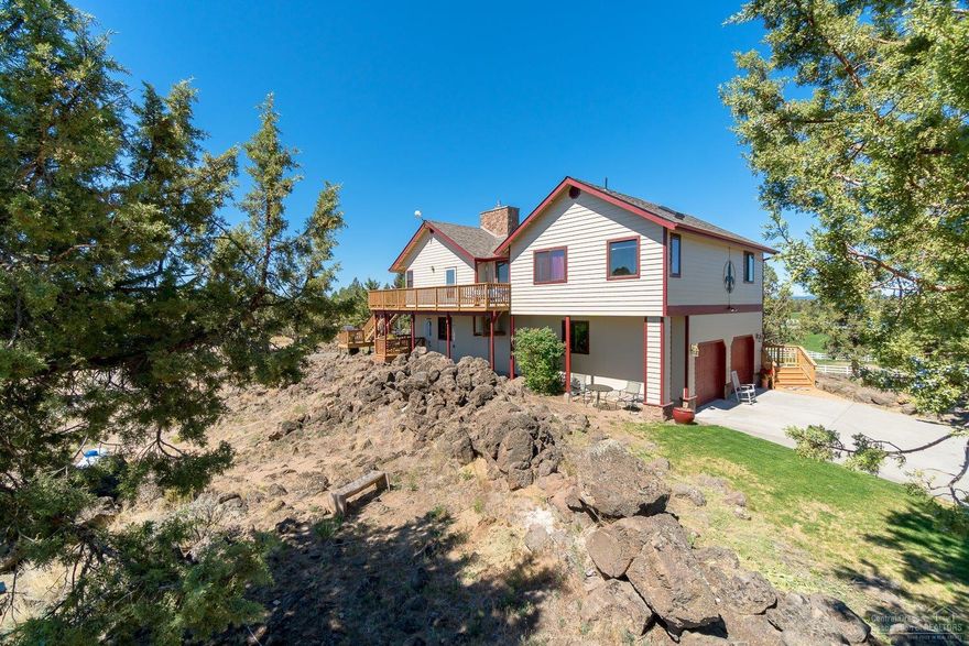 Welcome to This Spectacular Country Home on 40.18 Acres just 8 Miles from Bend with Panoramic 360 Mountain Views. Fenced, 2 Ponds & BLM Access. This 2458 sq ft 4 Bedroom 3 Bath Home has been Extensively Remodeled Including Master Bedroom & Bath, Chefs Kitchen with Knotty Alder Cabinets, Custom Tile Floors, New Roof, New Paint, Vaulted Ceilings & Walls of Windows. Guest Suite on Lower Level with Separate Entrance. Hot Tub Installed 2019. Soar with the Eagles from the Expansive Wrap Around Deck. New Fencing & Gated Entry. Custom 2220 sq ft Shop/Barn with Propane Heating System. Art Studio.. Two 100 ft. Greenhouses. New Well & Pump House. New Solar System for Shop & Greenhouse. Lavender in Ground.