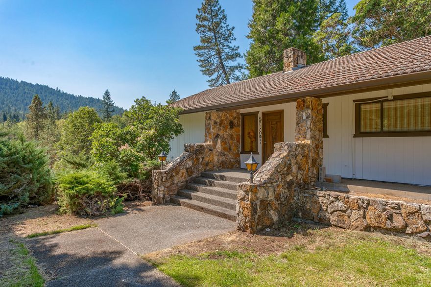 Remarkable Property! 42.49 acres zoned RR5 right in the heart of Colonial Valley. DIVIDE & DEVELOP. The existing home features 3 Bedrooms & bathrooms, 2 large living areas. Rock wall fireplace. Tile Roof. A new deck off the kitchen area. Ductless Mini sytem for heating and air. The lower level has a large family/Rec room. There is a 2 car attached garage and a 2 car detached garage. The property has 3 seasonal creeks running through it, the main creek is Louse Creek. The property is level to gently sloping. There are open areas and areas of tall pines and fir trees. Grape arbor behind the home and various fruit trees. Wildlife abounds! The property borders both Hoffman Way/Debrick Way at the north and Donaldson Road to the south, with walk-in access off or Eric Way also (see Plat Map). Potential for 8 lots at 5 acres each. So much potential for development. High producing well when drilled. Buyer to do their own due diligence regarding the uses and condition of the property.