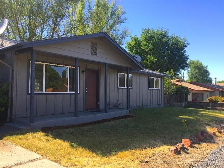 Wonderful starter home! This is a charming 3 bedroom, 1 bath Ranch Style home. Located on a quiet street close to shopping and amenities of down town. Newly updated with new windows, paint & wall heating. The home sits on a larger lot with a fenced yard, single attached garage and RV parking.
