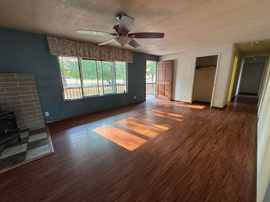 This home offers incredible potential on a spacious lot in a highly desirable NW Redmond neighborhood. Ideally situated just steps from a beautiful park and scenic canyon trail access, outdoor recreation is right at your doorstep. Conveniently close to shopping, dining, and everyday amenities—including Walmart just blocks away—this location offers everything you need. The home features a functional and comfortable floor plan, with a large paver patio and private deck off the primary bedroom that's perfect for relaxing or enjoying morning coffee. A storage shed is also included, offering extra space for tools, gear, or hobbies. Come add your personal touches to this unique property that offers location, space, and potential in one great package!