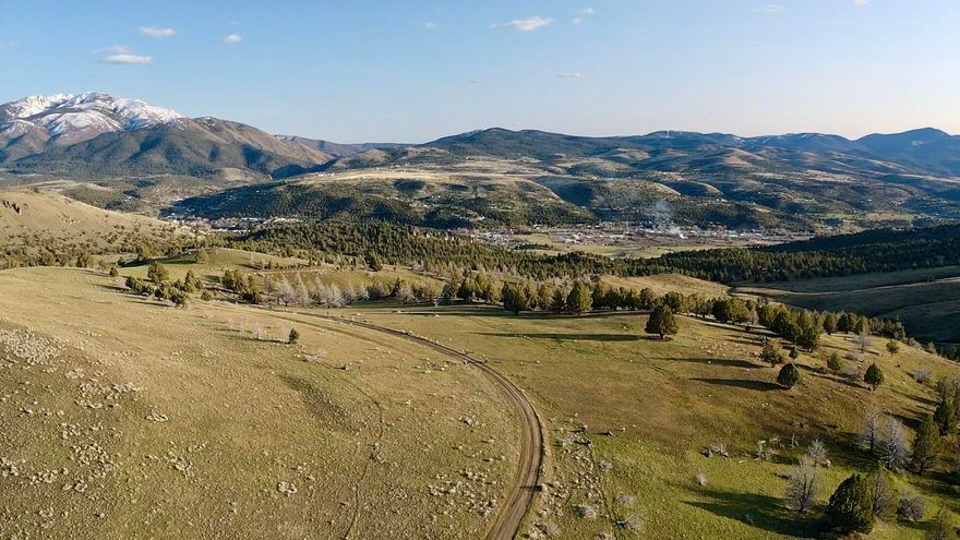 Looking for Off-Grid Property? Here is 12.52 +/- acres with spectacular views from Strawberry Mountain to the Aldrich Mountain Range. This is a private and secluded area (behind a locked gate) yet just minutes from John Day. On your drive up to the property you border Davis Creek that wildlife like to enjoy. There are two wells drilled on the property already. 1 GPM and 3 GPM well logs, pump is not included, but can be negotiated. Dry pasture area and good flat area to build. Property is buildable for a single-family structure. Property is partially fenced. No Power, Approved for a standard septic tank. There is a survey for the property with property pins located.