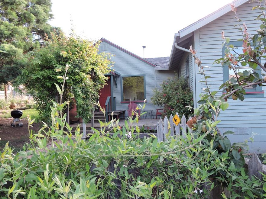 Great country cottage at the edge of Talent. Super quick drive to the Ashland Plaza. Very eclectic home and could possibly have two structures mingled together- but it works. Fantastic views of the south valley hills. 2 full baths, heat pump , new roof in 2015,new interior paint, natural gas to home, artistic kitchen with copper counters. Irrigation ditch runs though the property and splits the garden area from the home. Very unique affordable rural property.