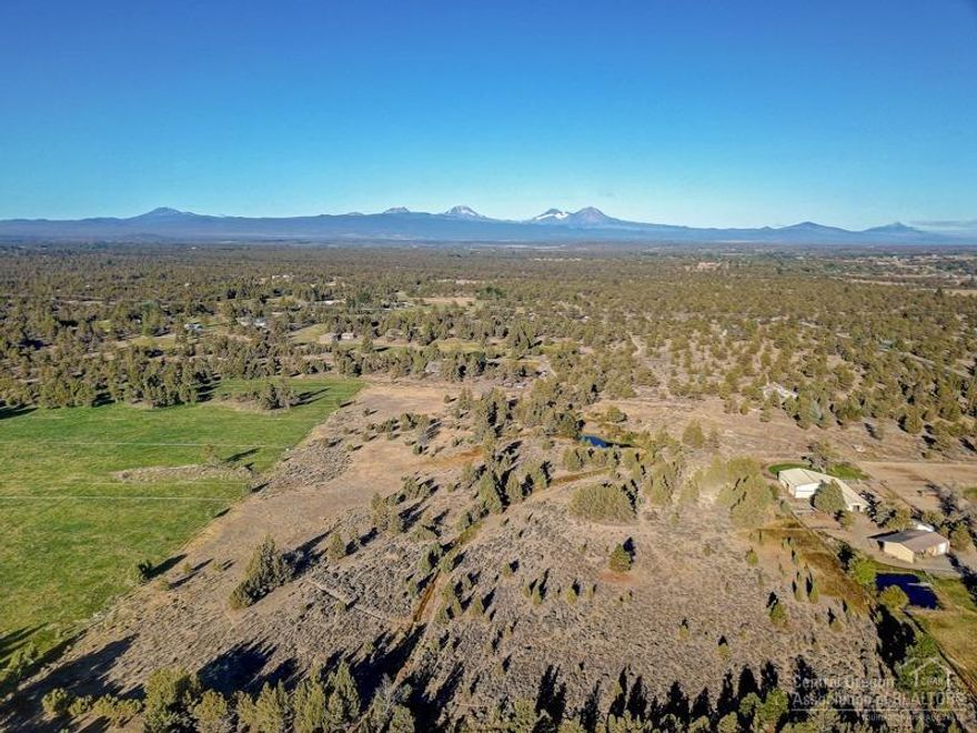 Opportunity for a very special hide-away with a private location off Deschutes Market Road. Beautiful 20 Plus acres with 5.6 acres of irrigation rights. Possible Cascade Mountain Views. Sparkling irrigation pond in the middle of property. Irrigation currently ''In Stream'' but rights are current. No irrigation equipment. **CUP for this property has been approved, call LA for details**