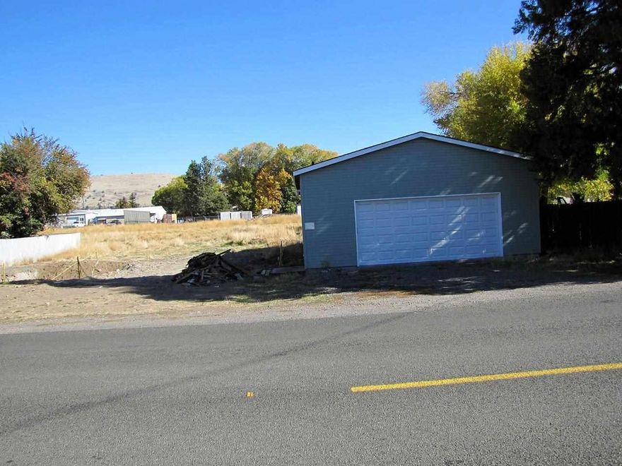 This Property Was The Site Of A Single Family Home Which Has Been Demolished. A 1300 Square Foot Newer Shop Now Occupies The Site With Power And Water Stubbed Up In The Lot. The Shop Is Insulated With A Bathroom And South Suburban Sanitation District Service. Shop Has 110 & 220 With Air Ducting For Compressor Use. Very Nice Location Could Be Used For Storage Or Other Related Activities. Purchase This Lot And Build Your New House Next To Your Large Shop.