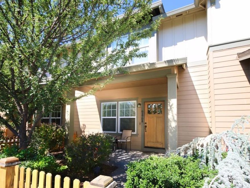 This turnkey townhome has a great location in popular Gardenside neighborhood and is steps away from Gardenside Park. It features open living space with large living room and gas fireplace, wood flooring, spacious kitchen and dining room with breakfast bar, stainless steel appliances, two master bedroom suites with private bathrooms, laundry room, covered front porch, rear patio with easy maintenanc, fenced backyard, central A/C with energy efficient heat pump system and a cottage style neighborhood.