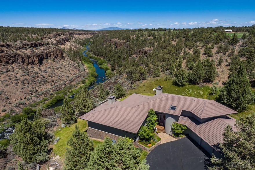 Located between Bend and Redmond, Rocky River Ranch sits on 124 acres with 3 individual tax lots. Cascade Mountain and Deschutes River Views. The custom 3387sf, 3 bedrooms, 3.5 bath home sits on the rim overlooking the Deschutes River. The 59.98 and 48.61 acre parcels include 66 acres of irrigation rights and hay production. Home includes updated kitchen, living, family, formal dining, and entertaining decks with river views. Three car garage, paved driveway, four bay shop, hay barn and vintage spud cellar.