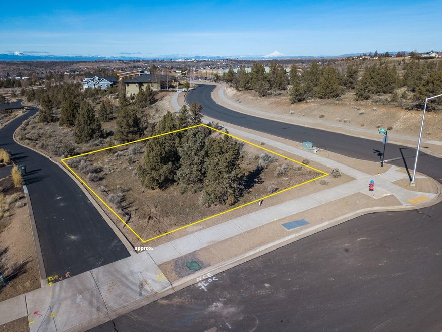 Take in the amazing views of the Cascade Mountain View range from this perfect future home sight. Not only a buildable corner lot, but also adjacent to the Yarrow
Homeowner Open Space. Alley access garage design allows your future home to take advantage of miles of Cascade Mountains / City Views. Located in the subdivision of Yarrow on the east side of Madras. Situated in close proximity to Madras Aquatic Center, walking paths, schools and Central Oregon Community College as well as Juniper
Hills park and the new Madras East Trails Loop.