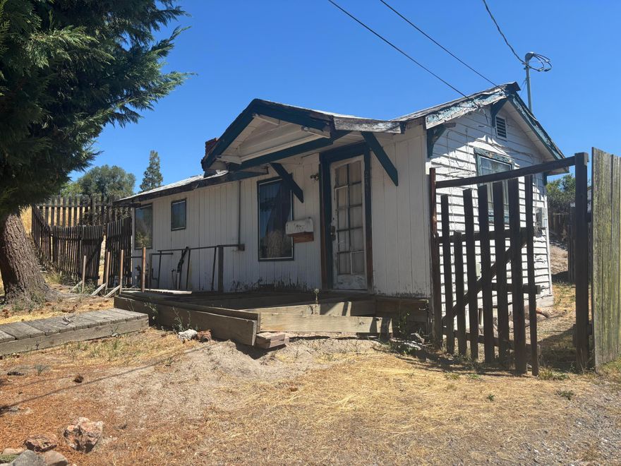 Zoned Apartment. Great affordable 2 bedroom 1 bath home centrally located. Cash or Seller will carry with 20% down.  Loan terms are 7.0% interest amortized over 30 years with a 5 year balloon.  Front deck is missing boards, so do not show during the dark. Seller is licensed  Real Estate Agent.