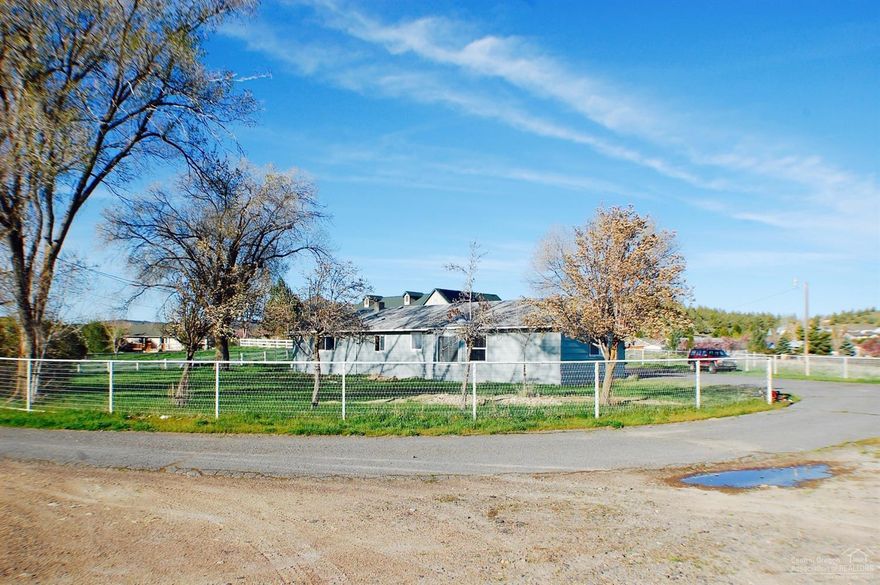 1946 farmhouse with character on 1.77 acre horse property! Quaint and clean 2bd 1ba 1287 sqft with views and end of road privacy. 1.1 irrigated acre, detached double car garage with shop area & 220 hookup, shed, and barn. Located in the urban growth boundary with development potential! Master bedroom has large walk in closet w/built in dressing table. Your chance to own acreage only minutes from downtown and schools. Fully fenced for your cows/horses/goats.