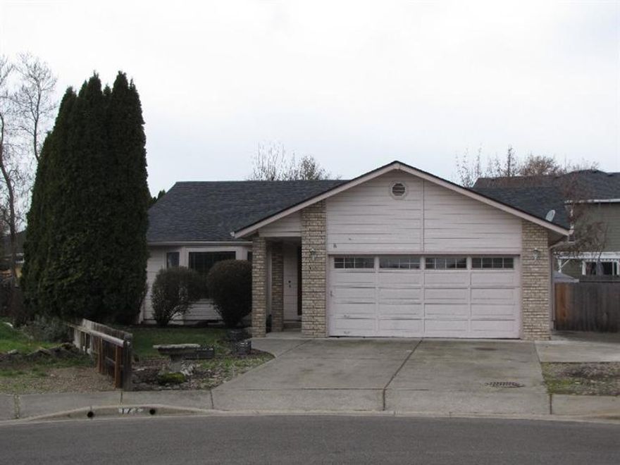Very nice and well maintained 3 bedroom, 2 full bath home on a large lot. Brand new carpet, tile flooring in kitchen, dining room, hallways, both baths and entry. Roof is only 2-3 years old. Located in a quiet cul-da-sac. Private backyard and large RV Parking.