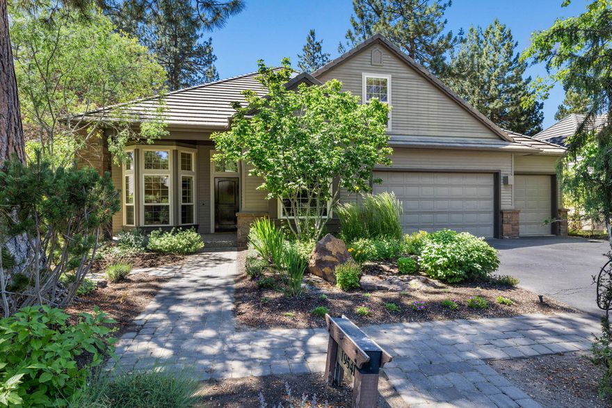 A Haven of Luxury in Bend. Step into this captivating 4-bedroom, 3.5-bathroom, PLUS den, & 3-car garage. This 2,950 sq ft home is a serene escape offering exquisite comfort, luxury, and elegance. Nestled in a picturesque garden-like setting, this meticulously maintained residence offers a well-thought-out floor plan that features a chef's kitchen, formal dining room, and wet bar. The seamless flow opens into a warm and inviting living room with exceptionally high ceilings that provide ample natural light. The expansive deck overlooks an acre of open space, creating an oasis that is perfect for quiet mornings, fun gatherings, or simply enjoying the tranquility of nature. Primary ensuite on the main floor, with a spacious walk-in closet. The upstairs bedrooms provide ample room to rest and relax for family or guests. Located in close proximity to Century Drive, this home is in an idyllic location with easy access to Mt. Bachelor as well as the best restaurants and shops in Downtown.