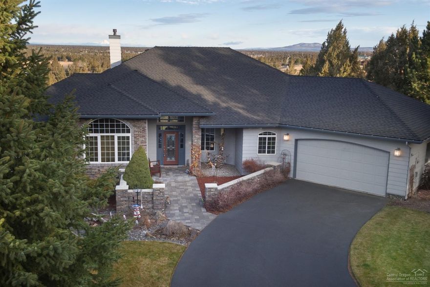 Cascade Mountain and golf course views from this lovely comfortable one level custom built one owner home. A chef's delight with this large open well appointed kitchen with granite counter tops, built in wine cooler, and all other appliances included. Located on a quiet street located in Eagle Crests gated neighborhood. Large master bedroom and master bath with jetted tub and separate shower. Hard to find entertaining size covered deck with hot tub.