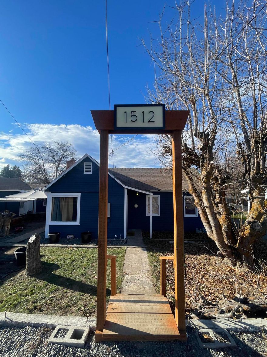 Charming 3-bedroom, 1-bath home on a .47-acre lot, PLUS a separate .44-acre parcel—totaling .91 acres! The additional parcel offers excellent potential: build another home, add a multifamily unit, or place a manufactured home. This property has had some updating inside and out, including: French drain and fresh gravel in the parking area, buried water line to the greenhouse, RV pad with water and sewer drain, 4 fruit trees (2 apple, 2 cherry), new cadet heaters in every room, new front steps with house numbers, updated light fixtures, door hardware and  a new tub surround. All the appliances are included. The courtyard has been cleaned, leveled, and graveled, while the backyard has been leveled. A drive-through gate provides easy access to the side and rear of the property. A rare opportunity with space, upgrades, and a valuable separate parcel. Schedule your showing today!