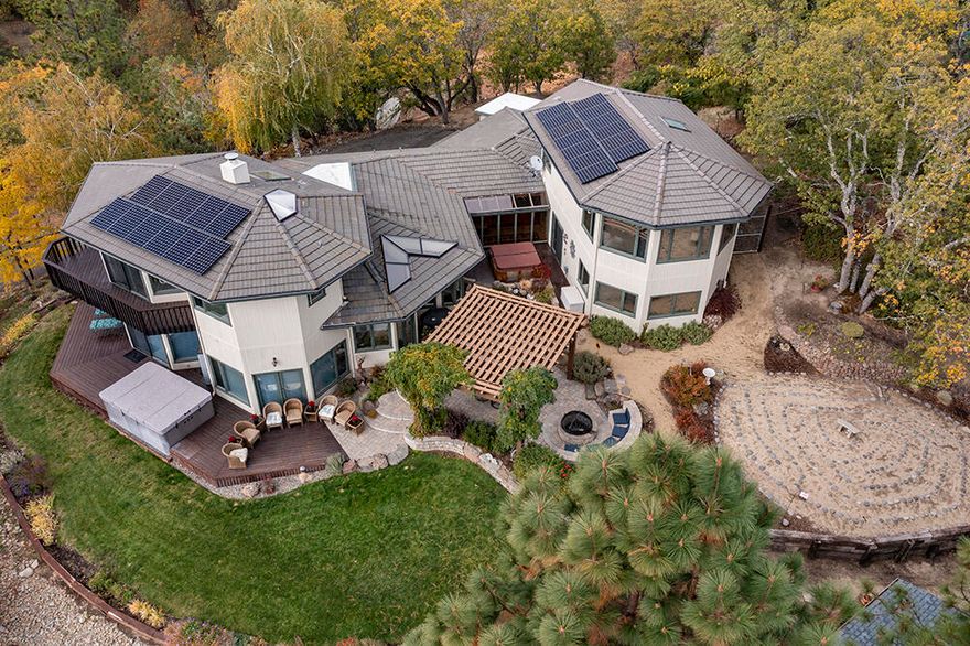 Spectacular 3961 Sq. Ft. Multi-Level Home, 7.75 Acres, on a Private Knoll Top Site with Stunning Views of the Valley! Private Gated Entry, and Paved Drive. Home has been completely updated including Trusouth Solar! Master Suite with Walls of Window looking out over the Valley, Bath includes a Slipper Tub, Dbl Sink Vanity, Large Shower and Custom Walk-In Closet. Kitchen that looks out to the Custom Pergola and Fire Pit includes a Lg. Walk-In Pantry, Granite Counters, Gas Range, and Dbl Ovens. Living Room with Coffered Ceilings w/lighting and Valley Views! Dining, and a Lg. Family Room with Open Beam Ceilings, a 65'' TV/Surround Sound System, Wet Bar & ice/ref, and a Kettler Ping Pong Table. A Bonus Room/Studio w/Full Bath, Bedroom and Closet/Storage Space galore. Property Includes a 30 x 40 Motorhome Storage/Shop with a TruGolf Simulator, Professionally Landscaped with Fenced Raised Garden Beds, Garden Shed, and room for Animals. Too Many Extras to List!