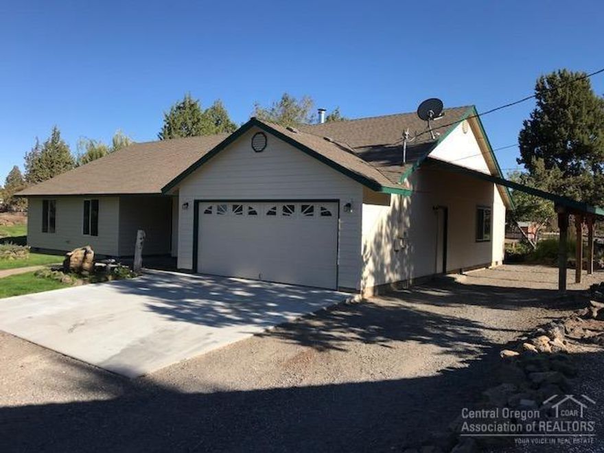 Adjoins hundreds of acres of BLM lands. This one has it all. 3 bed, 2 bath home, shop, & barn all on 4.75 secluded acres. Ready for new owners - floors have been refinished, exterior has been painted, well tests done and septic pumped. Perfect for out the gate riding-horseback or 4 wheelers-ride all the way to the river. Custom home features wood & tile floors, granite counters, & new tile shower in master bath. Access to patio from master w/trickling water feature. Mechanics dream shop w/heat, office, bathroom, & abundant cabinets. 3 stall barn w/tack room/hay storage. Gated, fenced & cross fenced. Beautifully landscaped w/fruit trees & secluded covered patio. Seller has purchased new home and this one is ready to go. See drone video in virtual media.