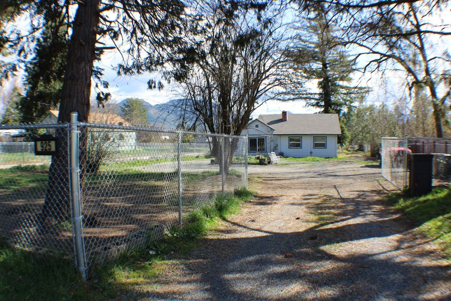 Location, Location, Location!!  This 1704sqft home is located next to Lincoln Elementary and close distance to Grants Pass High School.  Space to grow in this large .29 acre lot with 3 bedroom 1 bath home. This property is ready for someone to add their personal touches to make it their home. Opportunities are endless with this size lot in town. New roof in 2018 as well as newer appliances.  Buyer to do their own due diligence.