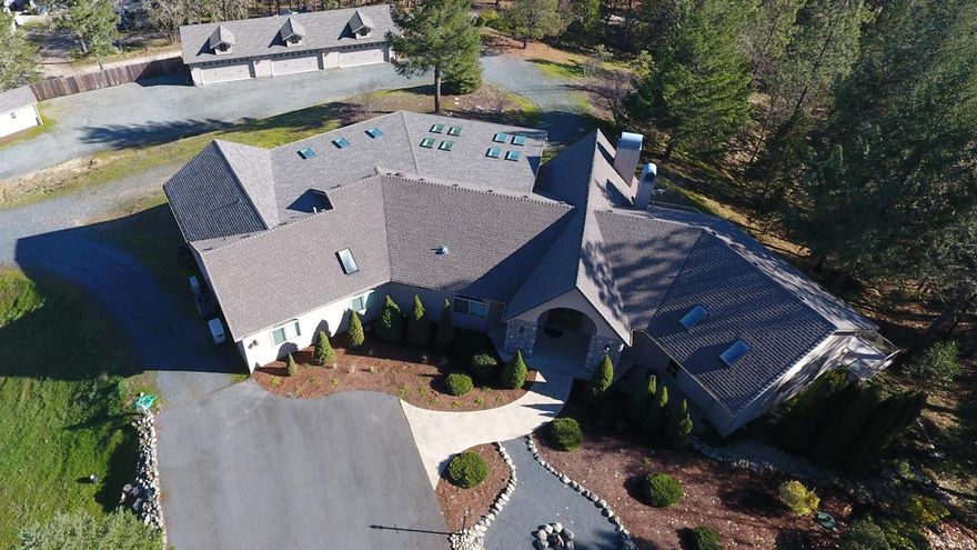 WOW! Majestic 3500 sq. ft. custom 1-story home w split Mstr bdm suite & a Jack & Jill guest bdm suite, open concept great rm-kitchen-dining rm-game rm, & unique powder rm. Interior upgrades are rustic Alder cabinetry & closet organizers, 8'' plank Hickory flrs, & porcelain slate tile in ba & utility rms, S/S appliances, granite counters, U&L cabinet lighting, walk-in pantry w/2nd fridge, wet bar & kegerator, washer/dryer & HD window coverings. Wood burning FPs in great rm & mstr bdm. More upgrades are triple zoned heating w/new dual fuel HVAC, 11KW generator & hot water Recirculating System. Exterior features, gated front & rear entrances, 2050 sq. ft. partially covered deck w/11 skylights, wired & plumbed for outdoor kitchen, 72'x24' 6-car insulated garage, separate work shop, RV Pad w/hook-ups, 5.33 fenced acres, wooded rolling hills, mtn vws, small orchard & much more... A Fabulous Must See'' Home! Information deemed accurate but not guaranteed & subject to change @ any time.