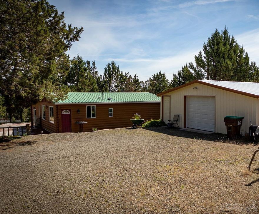 Cute, cute and ready for you! 2 bed, 1 bath little log home on 1.65 acres. Corner lot location close to Prineville. Detached single car garage with Shop/Craft area. No need to update or do a thing. This would be a great vacation spot or full time residence.