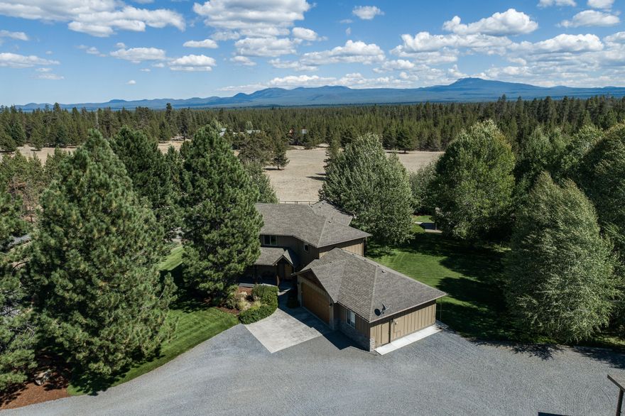 Welcome home to this NW lodge style dream home with panoramic views of the Paulina Mountains. Embrace nature, serenity & privacy at this meticulously cared for, fully fenced 6.27 acre equestrian retreat. Inviting & open great room w/18' vaulted ceilings, ledge rock fireplace, huge picture windows & gorgeous kitchen w/slate floors, knotty alder cabinets, granite countertops, newer SS appliances & walk-in pantry. Primary suite w/walk-in closet, travertine tile bath w/double sinks, jetted soaking tub & large shower w/dual showerheads. Step outside the French doors at night to marvel at the star-filled sky from the hot tub. Stairway w/custom pine log railing leads upstairs to 3 bedrooms, bath & bonus room w/Brazilian Cherry hardwood flooring & wet bar. French doors lead to Trex® deck to enjoy morning coffee while watching spectacular sunrises. Heated 30 x 40 shop, professional greenhouse & 36 x 36 barn w/power & water. Daily bird & wildlife watching. The ultimate Central Oregon lifestyle!