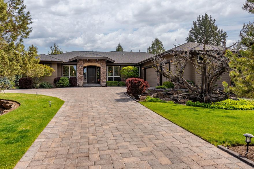 Jaw dropping & immaculately maintained Sage Builders custom home on Eagle Crest resort situated on large 1/2 acre lot! This main level beauty has been custom built and upgraded to provided the warmth and privacy 2nd to none; custom chef's kitchen w/ warming oven to boot! Host guests with expansive rear pergola paver patio (with ext. surround  sound) as well as a rear deck -  perfectly prepared for a hot tub of your choice. Pair this w/ the 2 additional bedrooms in the North wing and the executive office w/ custom built desk & credenza;  this luxury home has space for everyone. The additional crafted landscape provides a perfect formula for year-round fun, entertainment and relaxation. Eagle Crest is home to 3 - 18 hole golf courses, the Resort Course, where this home sits is also accommodated w/ river trails, 3 sport & fitness centers, indoor & outdoor pools, tennis, basketball, racquetball, pickle ball, a day spa, restaurants & more.