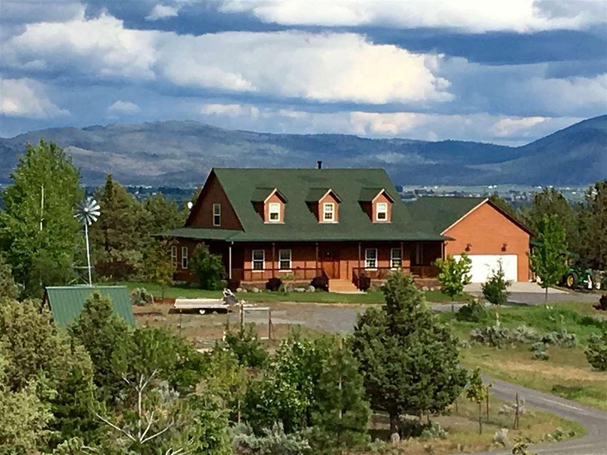 You Do Not Want To Miss This Listing! It Is Absolutely Beautiful With So Much To Offer! Featuring 20 Acres Of Land With A Fenced Orchard And Custom Built Chicken Coop With Additional Storage Space. There Is Also A 30 X60 Shop/Barn With Two 20 Wings/Lean-tu Off Each Side For Extra Space. Located Minutes From Town You Can Still Enjoy Country Style Living. The Custom Ranch Style Home Sits Way Up, Overlooking The City Of Klamath Falls And Lake Ewana, With Surrounding Mountain Views And Fields In The Distance.The Home Features 2252sf With Formal And Informal Dining, A Huge Living Room With Vaulted Ceilings And Floor To Ceiling Windows, Along With A Wood Stove For Additional Heating. Beautiful Hard Wood Floors And Tile Throughout. Upstairs Is A Bath Separated By 2 Bedrooms And A Balcony Overlooking The Living Room. On The Main Level You Will Find A Spacious Master With Walk In Closet And French Doors That Open To The Bathroom, And A Second Set To The Covered Back Porch. The Back Porch Is A