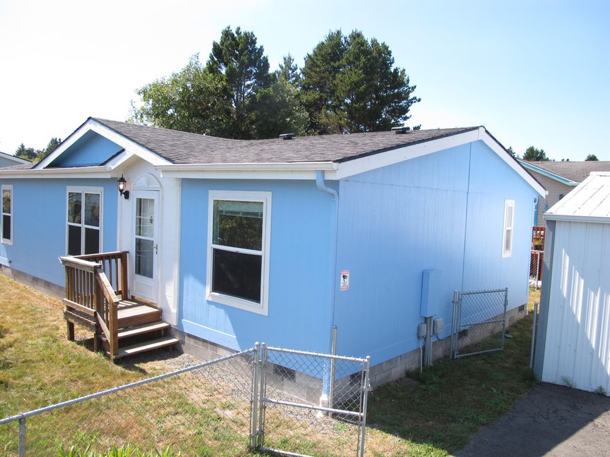 Nestled in a great neighborhood by the bay side of town just off Cape Arago Highway, this picturesque 3-bedroom, 2-bathroom gem built in 1999 offers an incredible opportunity to experience the serene beauty of the Oregon Coast. With 1,100 square feet of well-designed living space, this home is in excellent condition and comes with a detached 2-car garage for your convenience and a fenced yard. It is just a short couple mile drive to Charleston, Oregon or a few miles back to downtown Coos Bay. This will not last long and there are not many like this available at this price. Call for an appointment today. Listing agent is related to owner