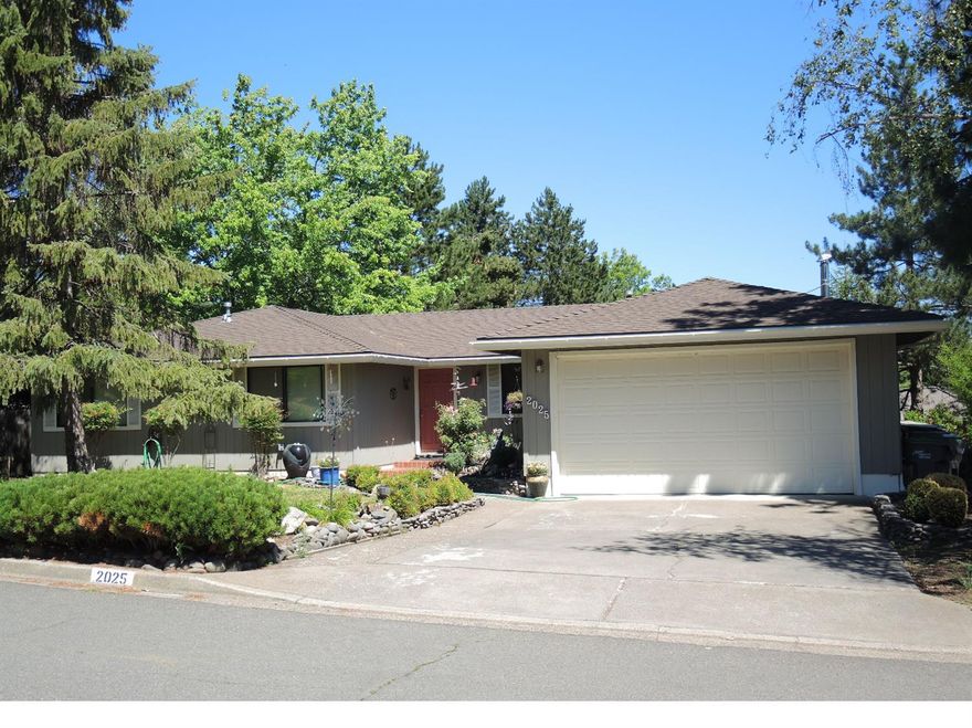 Lovely home in the highly desirable Mountain Ranch subdivision off Tolman Creek Rd. This home has a cozy family room with wood burning stove and an open floorplan with a separate formal living room. The sunroom off the family room is a wall of windows highlighting the big views of this home. The beautifully landscaped private yard has a new deck and is perfect for entertaining. The views of the cascades and Grizzly Peak are simply stunning. The backyard has direct access to the greenway and close to Oredson Todd Woods and miles of hiking trails. Just 3 miles from downtown Ashland and the world famous Oregon Shakespeare Festival.