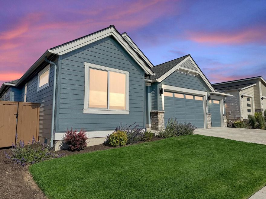 Rare opportunity to own the highly sought-after Carrington plan by Pahlisch Homes—now sold out, but available here as a nearly new resale in Bend's sought-after Petrosa community. At 2,248 sq ft, this thoughtfully designed home offers three spacious bedrooms—each with direct bath access—including a luxurious primary suite with walk-in closet, soaking tub, and tiled shower. Built in 2023 and gently lived in as a second home, it features custom window treatments, quartz counters, full-height tile backsplash, gas fireplace, walk-in pantry, tankless water heater and a 3-car garage. The vaulted great room opens to a covered patio and low maintenance yard—perfect for enjoying Central Oregon's sunny days. Petrosa is a vibrant master-planned community offering a clubhouse, co-working space, pool, hot tub, splash pad, fitness center, community fire pit, parks, trails, and direct access to Pine Nursery Park. Minutes to schools, Forum shopping center, and St. Charles Medical Center.