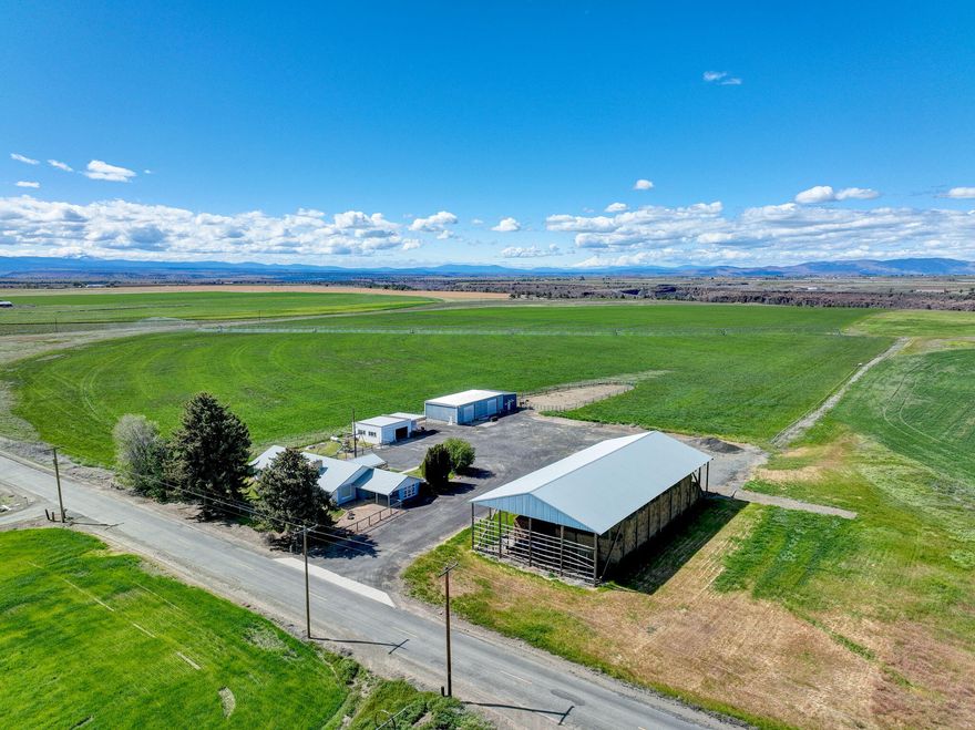 Highly productive 198 acre farm in Central Oregon with 146.9 acres of Deschutes River water rights. This farm is very efficient with three newer center pivots covering the.bulk of the farmable acreage. Property has a nicely updated 4 bed 2 bath home with gorgeous unobstructed views of the Cascade Mountains, and a 360 degree view of the local mountains. The master suite was added in 2012 complete with a walk in closet, jetted tub and a propane fireplace to keep you cozy. Property is conveniently located a paved dead end road only a couple miles from Madras with shopping and schools a very short commute.This property borders BLM lands and includes a portion of Willow Creek Canyon where Mule Deer are frequently seen. Outside is landscaped fenced yard along with a detached garage, a large shop, a hay shed and a horse barn with tack room and storage area. Here is your chance to own a turn key farm in beautiful Jefferson County