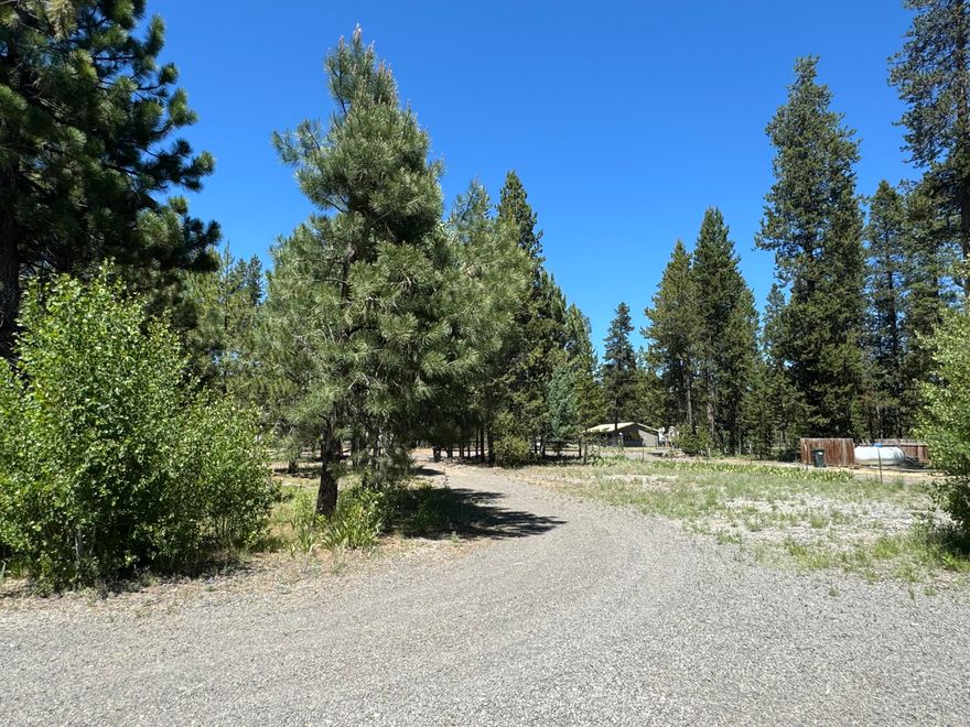 2,- 1/2 acre lots with well house (not for residential water use)  and RV hook up, no septic.
Driveway and fence improvements.